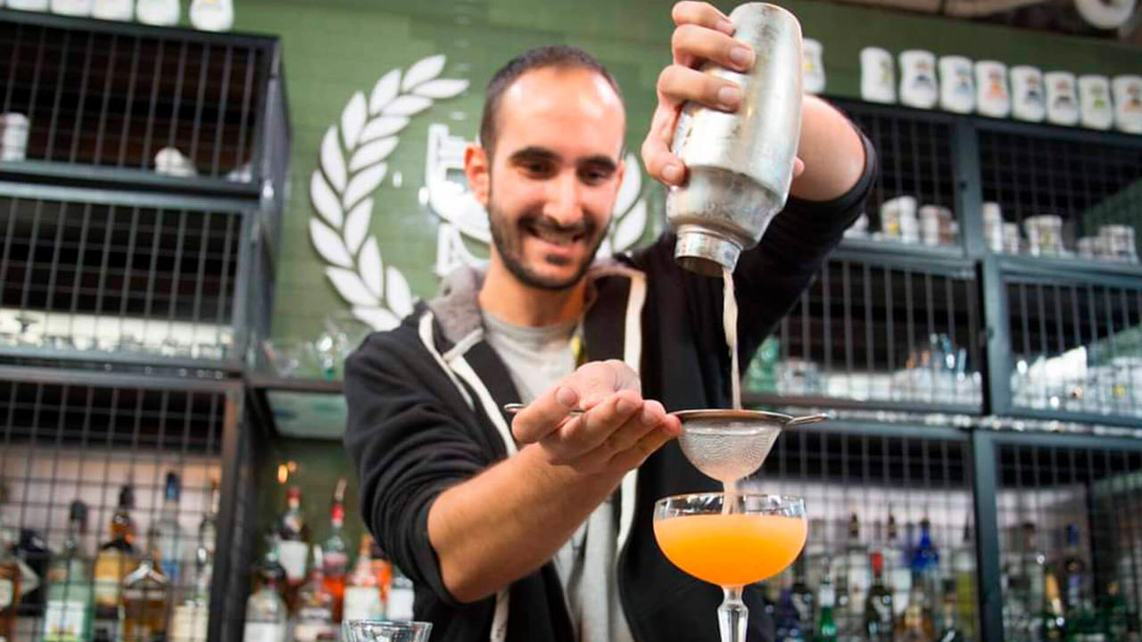 Giorgos making cocktail