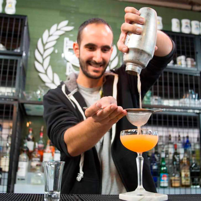 Giorgos making cocktail